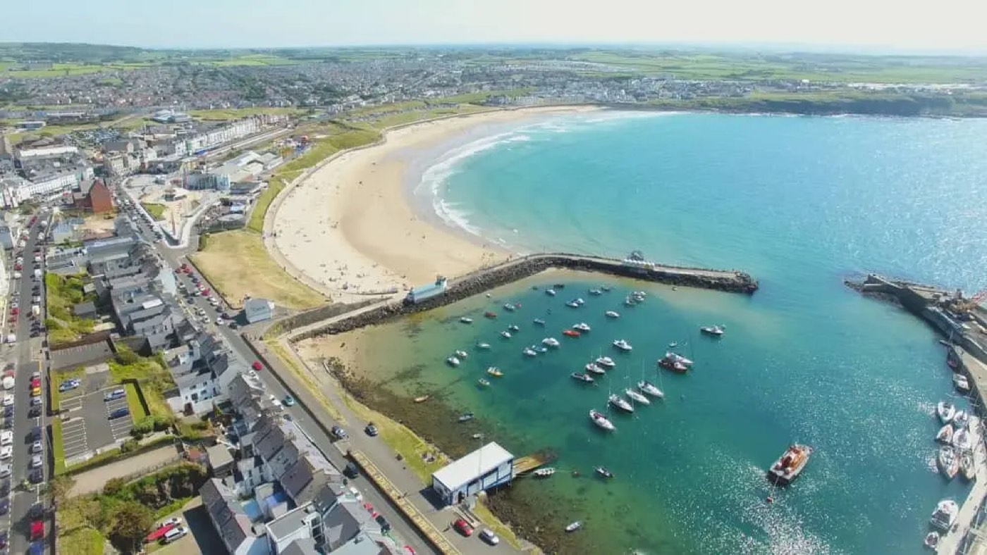 Aerial view of West Strand beach and Portrush harbour