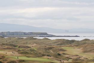 Royal Portrush Golf Club from the air looking back towards Portrush town