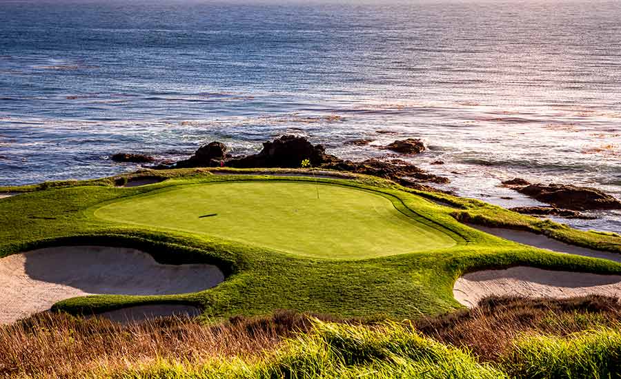 A golf course by the ocean